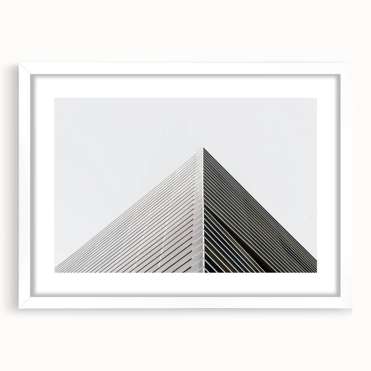 Extra large abstract art print with textured design in muted earth tones on a white framed canvas.
