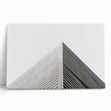 Large black and white abstract print on stretched canvas, featuring dynamic brush strokes.