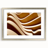 Abstract art print in silver frame featuring swirling blue and gray tones, suitable for dining room or bedroom wall.