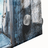 Large abstract wall art in vibrant orange and blue tones on acrylic glass.