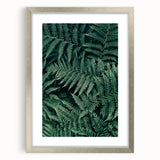 Silver-framed photo display featuring a mat for added depth, showcasing a front view of an elegant artwork, ideal for home decor or gallery presentation.