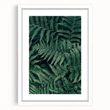 White picture frame with a mat, showcasing a blank space ideal for artwork or photographs, set against a neutral background. Perfect for home decor or gallery displays.