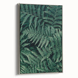 Framed canvas artwork showcasing an elegant abstract design in vibrant colors, displayed with a sleek silver frame, perfect for modern home decor or office settings.