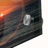 Large abstract wall art in vibrant orange and red tones on acrylic glass, ideal for dining room ambiance.