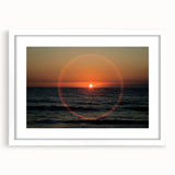 Abstract art print featuring swirling blue and gray patterns on a white framed canvas.