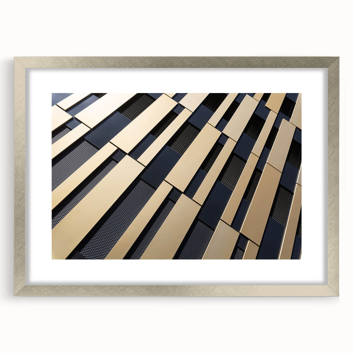 Abstract art print featuring swirls of blue and gray on a silver-framed canvas, suitable for bedroom or dining room decor.
