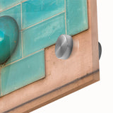 Large abstract wall art in vibrant orange and blue tones on acrylic glass.