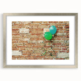 Textured art print featuring abstract swirls in muted gray, displayed in a silver frame, suitable for bedroom decor.