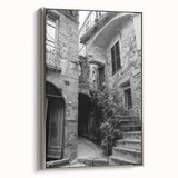 Silver-framed canvas featuring a vintage landscape art painting with a colorful palette.