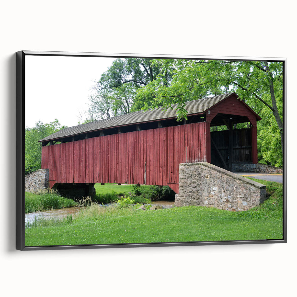 Framed canvas featuring a black and white landscape painting in a vintage poster style, ideal for bedroom decor.