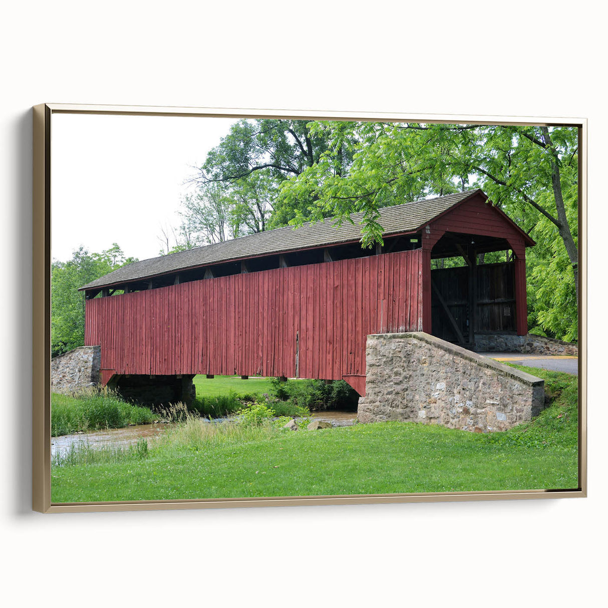 Framed canvas featuring a vintage landscape painting in muted gold and black tones, ideal for bedroom decor.