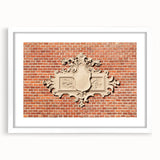 Abstract art print featuring swirling blue and gray tones on a white framed canvas.