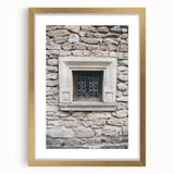 Abstract art print featuring textured swirls in neutral tones, displayed in a gold frame, ideal for living room decor.