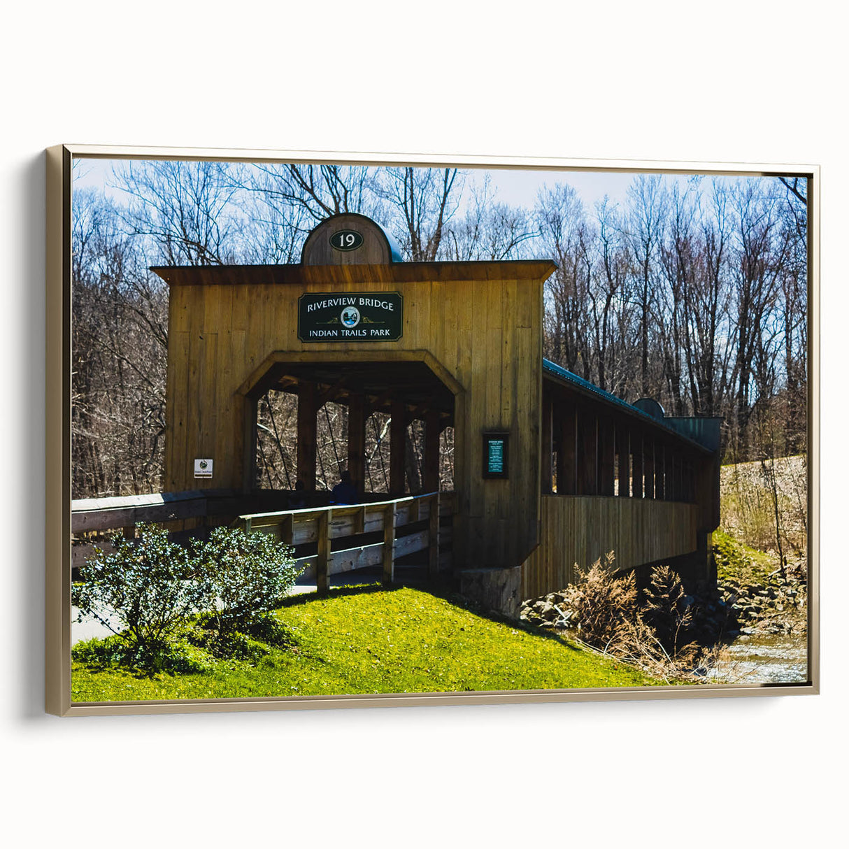 Framed canvas featuring a vintage landscape painting with muted earth tones, ideal for bedroom wall art.