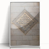 Art deco poster of geometric shapes in muted gold and white, framed acrylic, suitable for modern nursery wall decor.