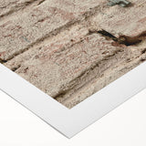 Art deco poster featuring a geometric pattern in black and gold on a rolled canvas, suitable for dining room decor.