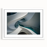 Extra large abstract art print featuring textured swirls in muted gray and blue tones on a framed canvas.