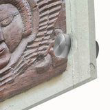 Large abstract wall art in vibrant orange and blue tones on acrylic glass.