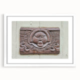 Abstract art print featuring swirling blue and white patterns on a framed canvas.