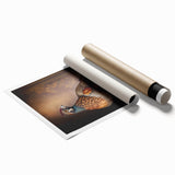 Rolled canvas print showcasing vibrant African tribal artwork, featuring intricate patterns and colors, securely packaged in a protective cardboard tube for shipping.