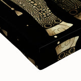 Close-up of a stretched canvas showcasing vibrant African wall art, highlighting intricate patterns and textures, perfect for home decor enhancement.