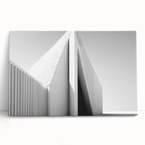 Large black and white abstract painting on stretched canvas, featuring fluid lines and shapes.