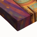 Close-up view of a stretched canvas showcasing vibrant abstract art with rich textures and colors, ideal for modern home decor and artistic displays.