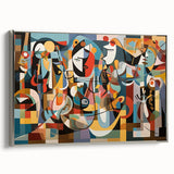 Framed canvas artwork showcasing a vibrant abstract design in bold colors, viewed from the side to highlight the elegant silver frame and textured surface.