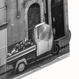 Large abstract acrylic print featuring swirling blue and gray tones.