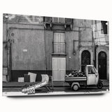 Large abstract wall art on acrylic glass featuring swirling blue and gray tones, suitable for bedroom or dining room decor.