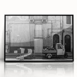 Large abstract wall art featuring dynamic swirls in muted earth tones on a framed acrylic.