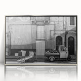 Mid-century modernist art featuring geometric shapes in muted tones on a framed acrylic print.