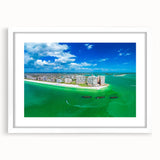 Abstract art print in vibrant blue and green tones on a white framed canvas, ideal for dining room decor.