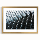 Textured abstract art print in muted gold and cream tones on a framed canvas, ideal for bedroom wall decor.