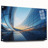 Large abstract wall art on acrylic glass, featuring swirling blue and gray tones, suitable for bedroom or dining room decor.