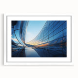 Extra large abstract art print featuring textured swirls in muted gray and blue tones, framed in white.