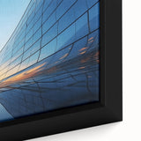 Framed canvas featuring textured, colorful art with abstract designs in black.