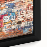 Close-up of black wall art on framed canvas featuring colorful, textured abstract design, ideal for living room decor.