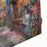 Large abstract wall art on acrylic glass featuring swirling blue and gray tones.