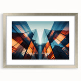 Abstract art print featuring swirls of blue and silver on a framed canvas, suitable for dining room or bedroom decor.