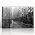 Large abstract wall art featuring swirling blue and white patterns on a black acrylic print.