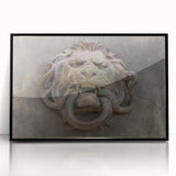 Large abstract wall art featuring swirling blue and gray tones on acrylic, framed in black.