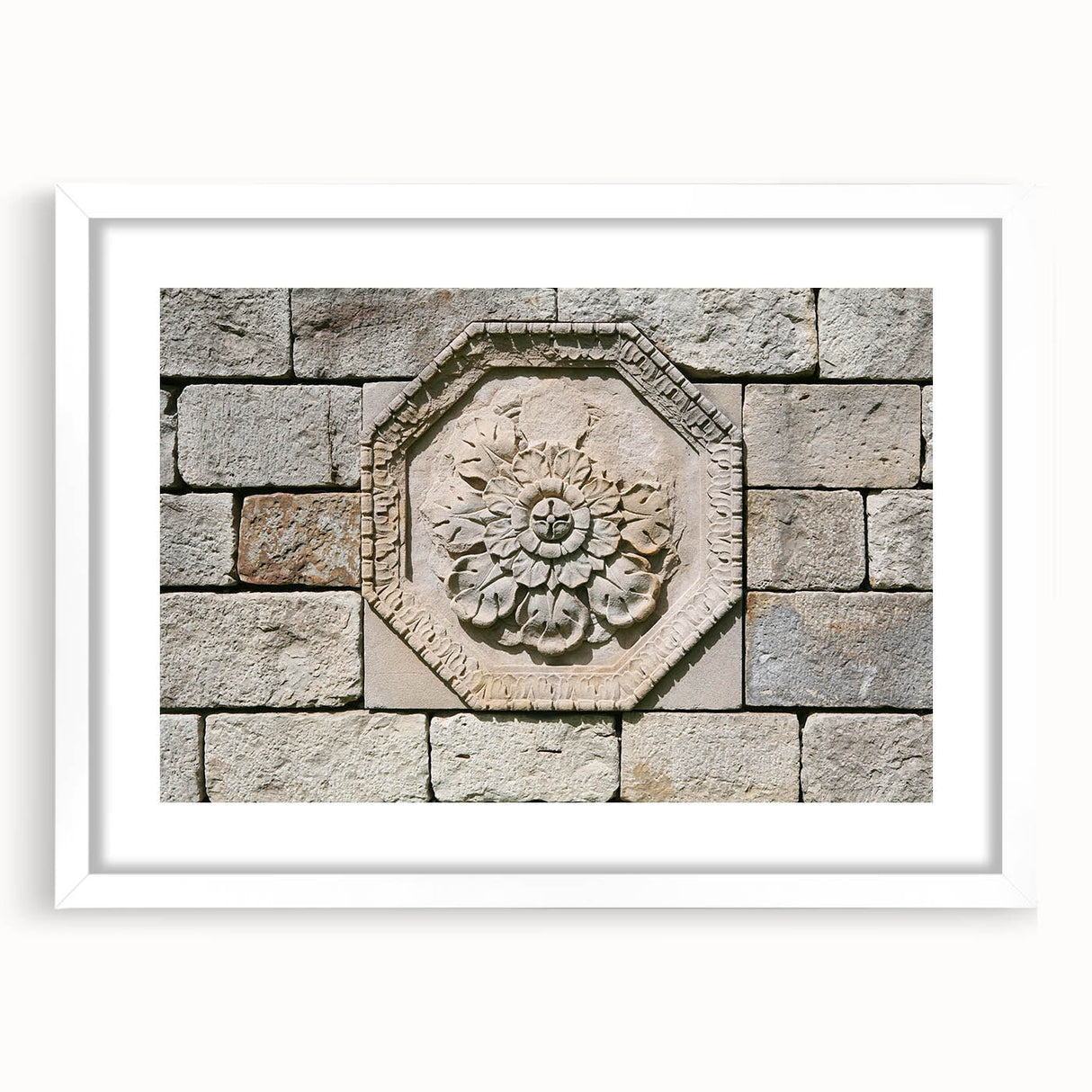 Abstract art print featuring swirling blue and grey tones on a white framed canvas.