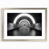 Abstract art print featuring swirling blue and grey tones on a framed canvas, ideal for modern bedroom or dining room decor.