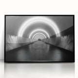 Large abstract wall art featuring swirling blue and gray tones on a framed acrylic print, ideal for modern living room decor.