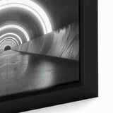 Close-up of black textured wall art with colorful abstract patterns on a framed canvas.