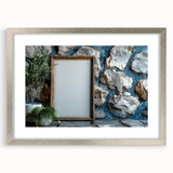 Textured abstract art print in silver frame, featuring swirling gray patterns, ideal for modern bedroom decor.