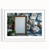 Abstract art print featuring swirling blue and gray tones on a white framed canvas.
