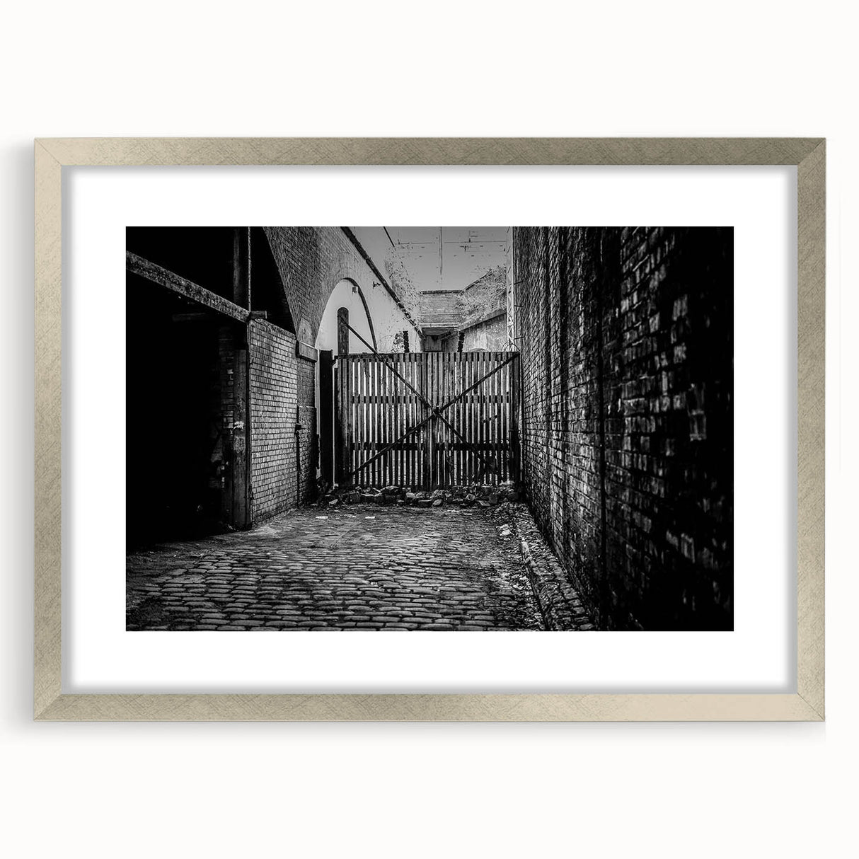 Textured abstract art print in muted gray and blue tones on framed canvas, suitable for modern bedroom decor.