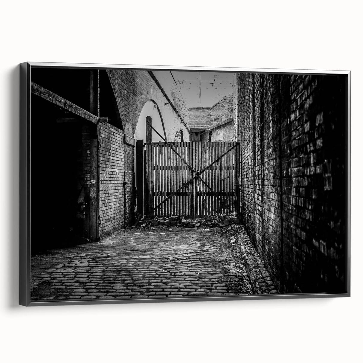 Framed canvas featuring a black and white vintage landscape painting, ideal for bedroom wall decor.
